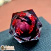 D20-DEMLIQ-RED-02 Œil de Démon – D20 à cœur liquide | Dé JDR premium en résine